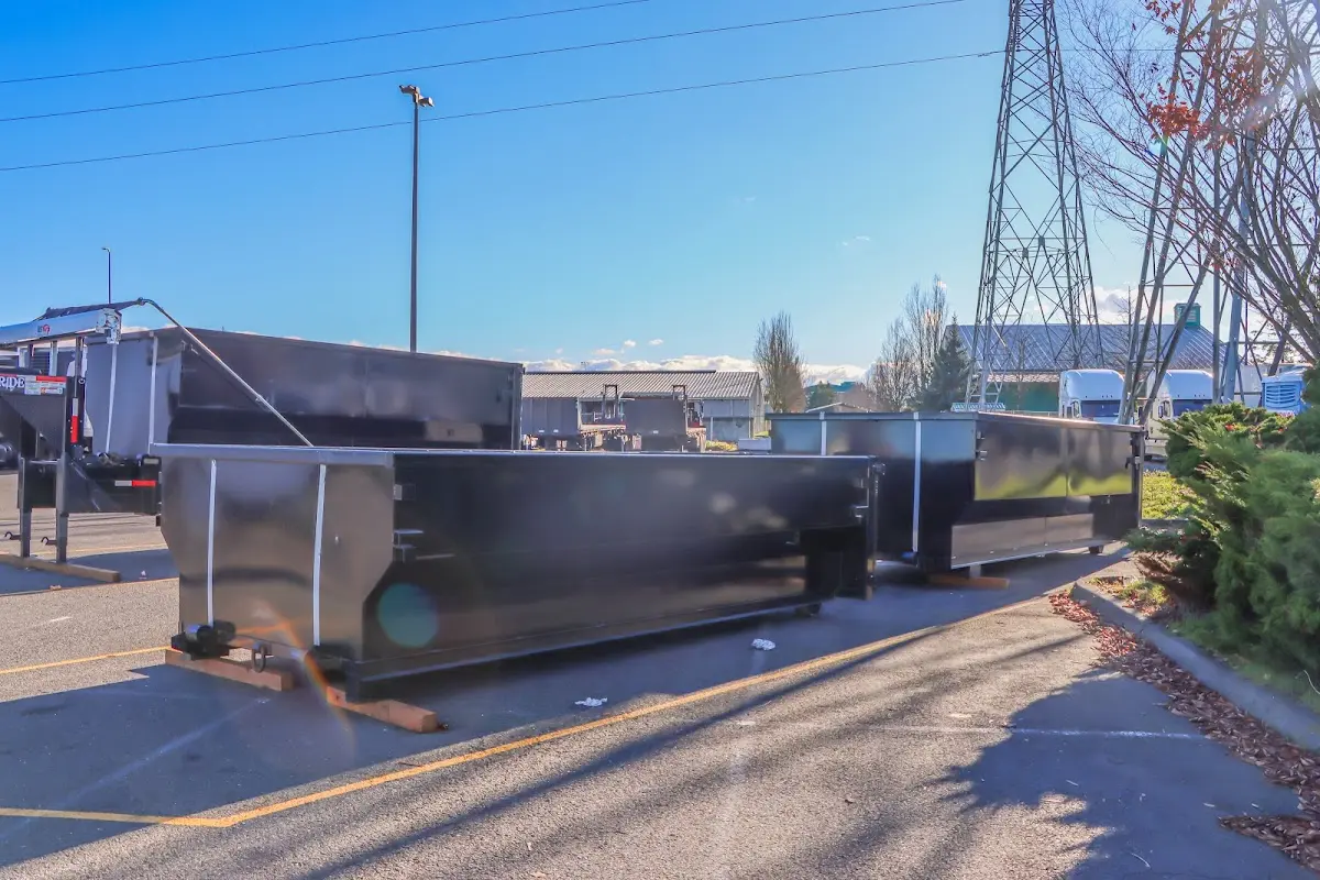 Roll-off dumpster ready for waste disposal at job site for 6 Yard Dumpster Rental in Stowe